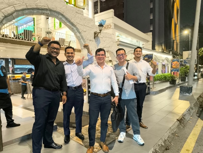 Outdoor group photograph reflecting relationship-building